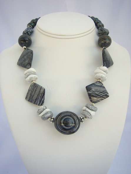 Contemporary black and white.  Sard onyx, howlite and zebra jasper necklace. Horizontal lines in center stone are light reflecti