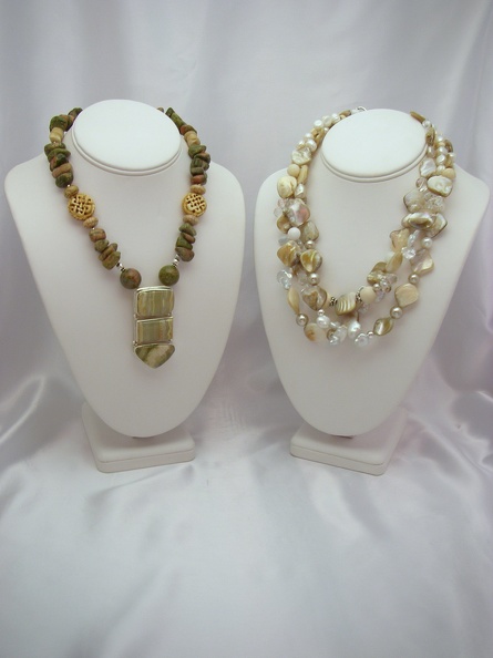 Left: triple o new pieces for fall. jasper pendant on unikite with carved bone
Right: Triple beige mother of pearl and freshwater pearl with rock quartz accents pearls_and_unikite.jpg