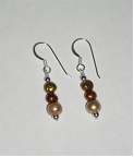 Golden freshwater pearl sterling earrings. Matching necklace with same number E1013 $26.00