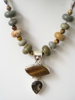 Close up of tiger's eye and smokey quartz pendant necklace.  19.75&quot; long 
TR2055   $155.00 