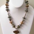 Tiger_s_eye_and_smokey_quartz_sterling_pendant_on_ocean_jasper_necklace.jpg