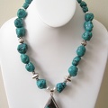 Turquoise sterling pendant necklace. Bali sterling accents. Stately.  19-20&quot; long with an expandable sterling toggle.  EG20